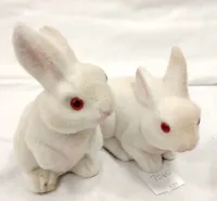 TWO FLOCKED MEDIUM SIZE PLASTIC BUNNY RABBITS