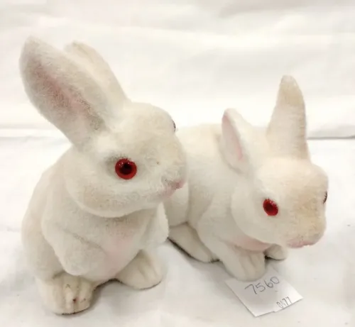 TWO FLOCKED MEDIUM SIZE PLASTIC BUNNY RABBITS