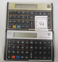 TWO HEWLETT PACKARD HC 12 CALCULATORS