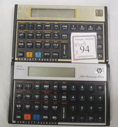 TWO HEWLETT PACKARD HC 12 CALCULATORS