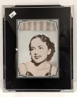 OFFSET LITHOGRAPH OF OLIVA DE HAVILAND GLASS FRAME