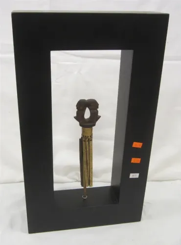 DECORATIVE BATAK BAMBOO CALENDAR WITH TWO FIGURES ON DECORATIVE STAND