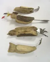 FOUR CARVED FOLKART WOODEN BIRDS WITH "TAILS" OF UNTENCILS