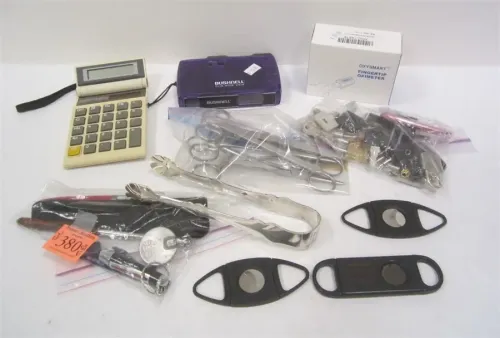 CALCULATOR, BUSHNELL, SMALL PADLOCKS, SCISSORS AND MORE